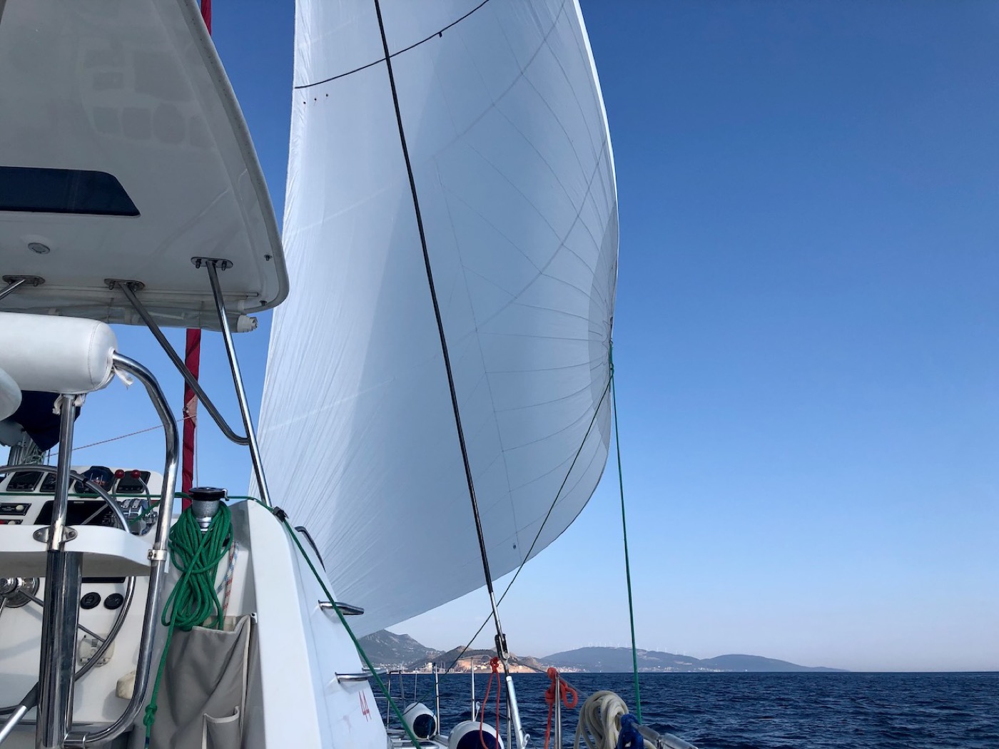 Catamaran sails in the wind
